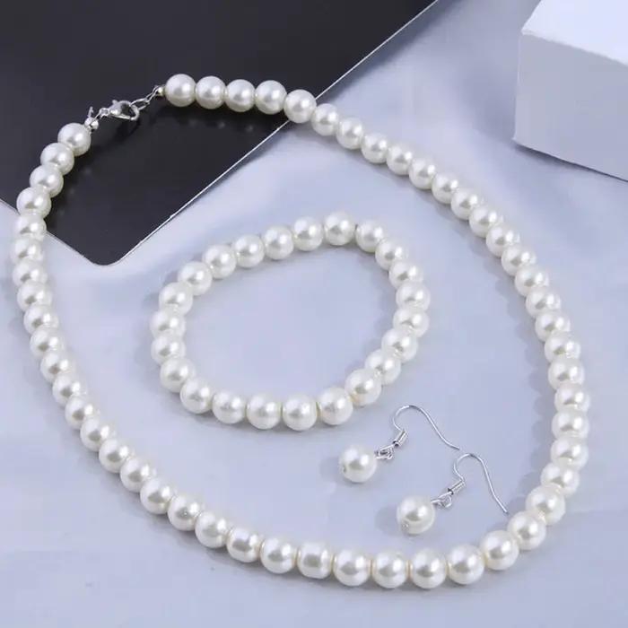 Ensemble de bijoux en fausse perle collier perlé élégant bracelet et boucles d'oreilles pour femmes romantiques occasions spéciales anniversaire mariage cérémonie événements