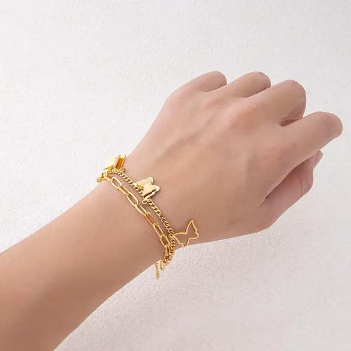 Bracelet pour femme en acier inoxydable avec motif papillon et chaîne de maillons élégante