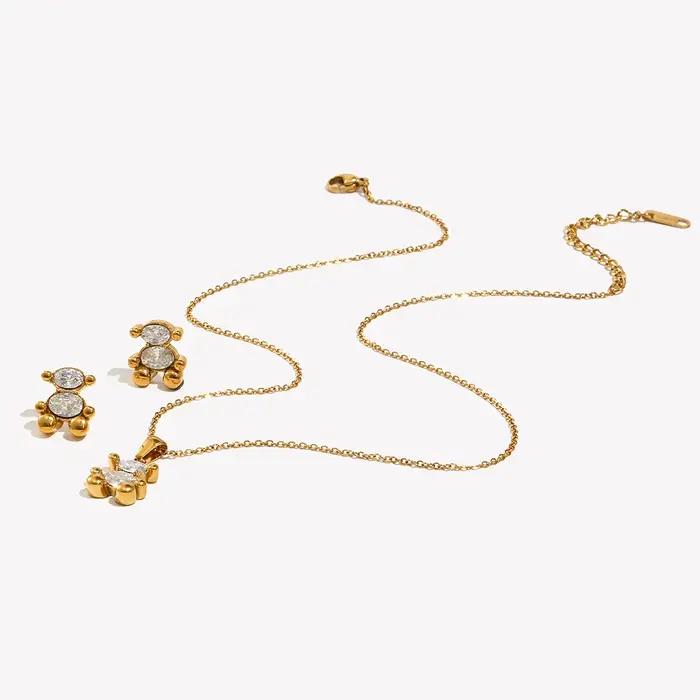 Ensemble de bijoux ours mignon plaqué or hypoallergénique collier et boucles d'oreilles pour femme occasions sociales style classique polyvalent