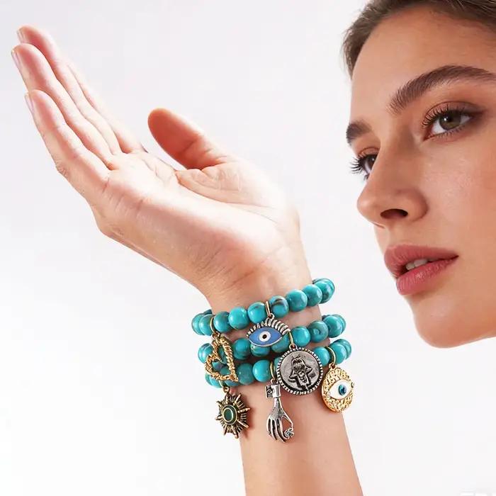 Bracelet bohème turquoise multi-breloques avec breloque œil porte-bonheur