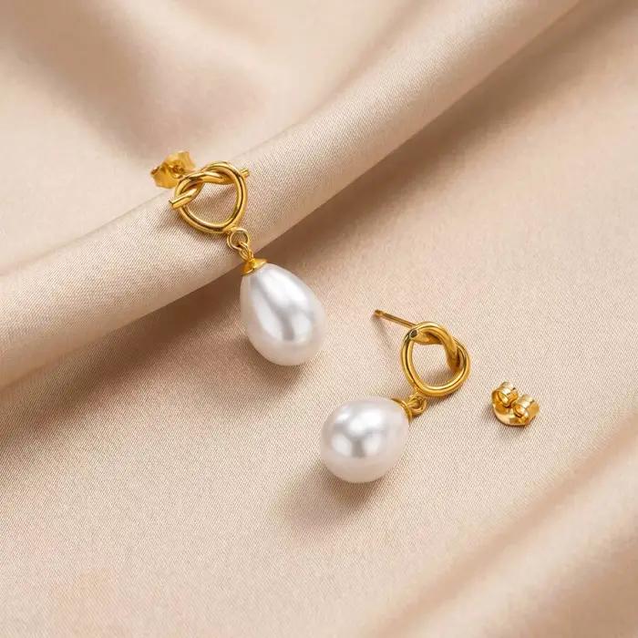 Boucles d'oreilles pendantes avec perle en forme de goutte et nœud, en acier inoxydable plaqué or 18 carats, bijoux étanches et anti-ternissement, cadeau idéal pour les fêtes