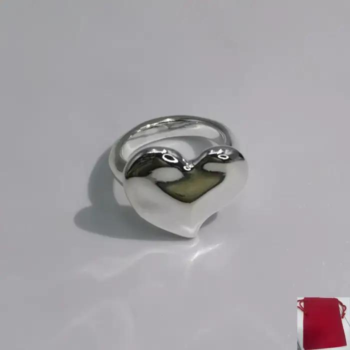 Bague en forme de cœur or et argent unisexe classique pour parties et occasions spéciales bijou romantique élégance moderne