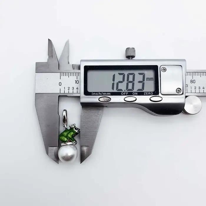 Breloques en forme de grenouille pour hommes et femmes
