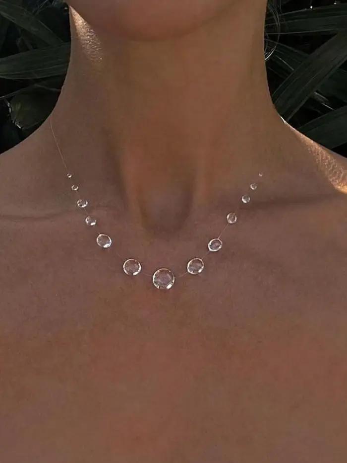 Collier série pompon en forme de goutte de rosée transparente