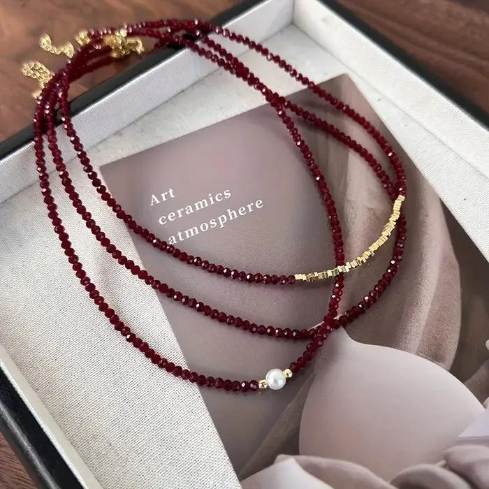 Collier de perles rouges acryliques avec strass pour femmes élégant et moderne pour parties et soirées