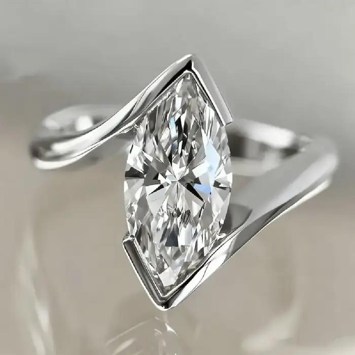 Huitan – bague en forme de marquise pour femmes, couleur argent/or, incrustée de CZ brillant, accessoires de mode pour fête de mariage, bijoux polyvalents