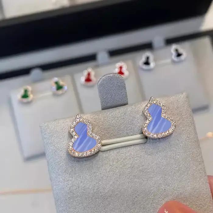 Boucles d'oreilles en émail vert pour femmes, design moderne, bijoux élégants et uniques, accessoires de mode pour toutes les occasions, bijoux de marque de luxe