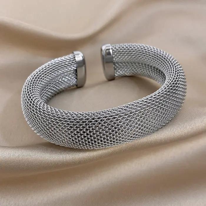 Bracelet manchette Greatera en acier inoxydable finition or ou rhodium style classique géométrique pour hommes et femmes occasions spéciales