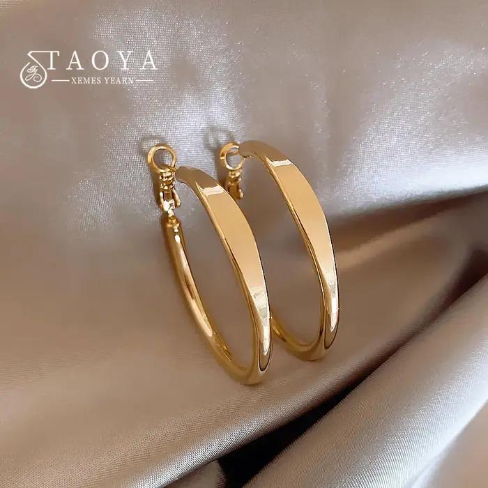 Boucles d'oreilles circulaires simples plaquées or 18 carats