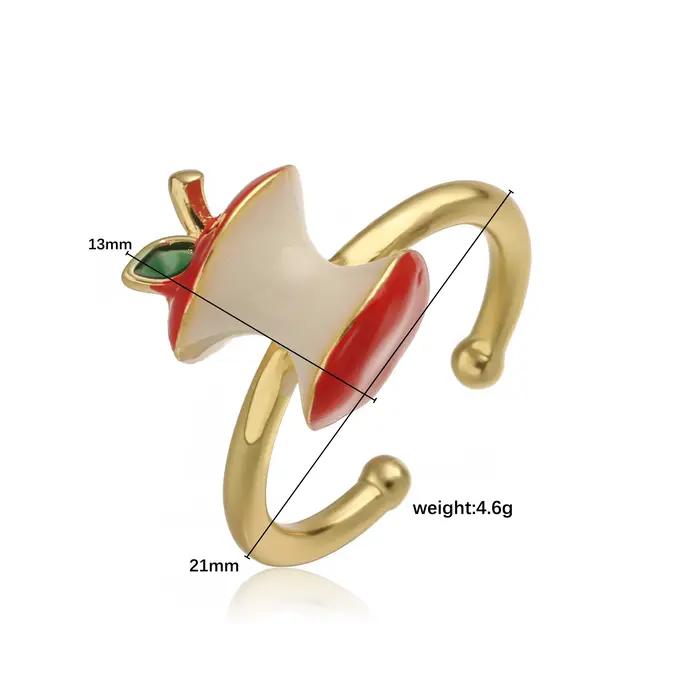 Bague en laiton plaquée or 18 carats avec pomme rouge émaillée ajustable pour femmes occasions générales style moderne bijou unique