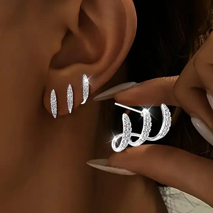 Boucles d'oreilles élégantes à trois griffes en strass pour femmes