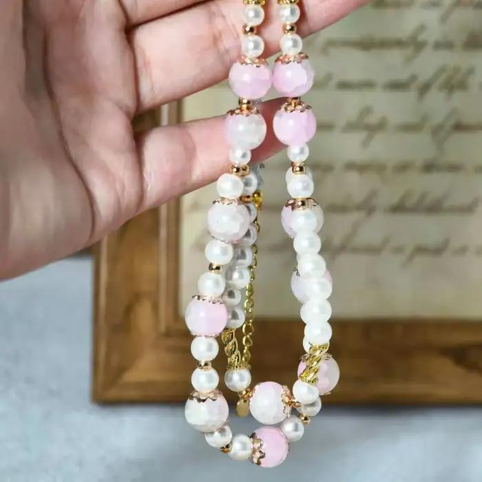 Collier à double rangée avec chaîne de perles en cristal rose