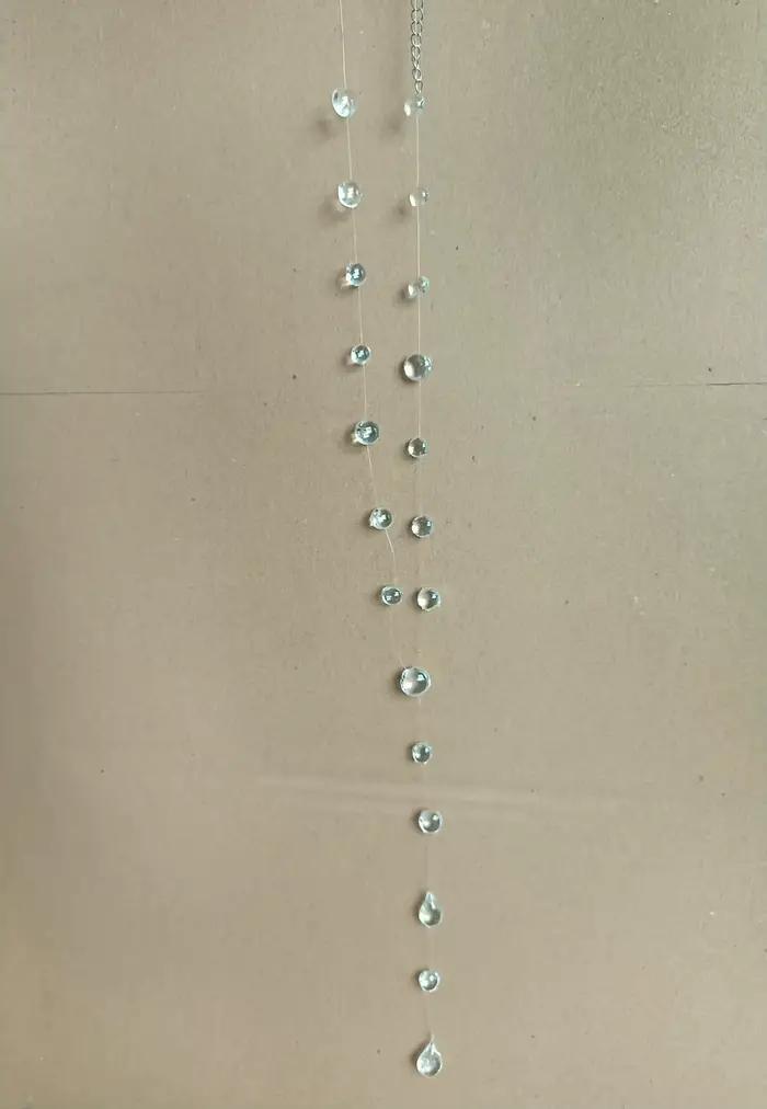 Collier série pompon en forme de goutte de rosée transparente