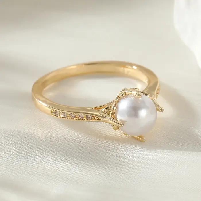 Bague dorée élégante de style bohème avec imitation de perles pour femmes