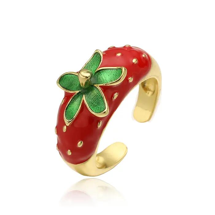 Bague en laiton plaquée or 18 carats avec pomme rouge émaillée ajustable pour femmes occasions générales style moderne bijou unique