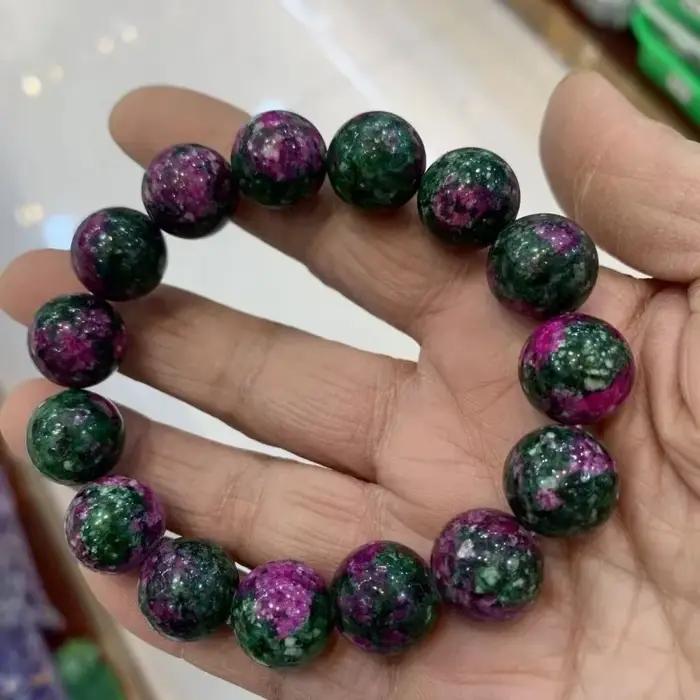 Bracelet de perles rondes en jade de fleur de pêcher colorée