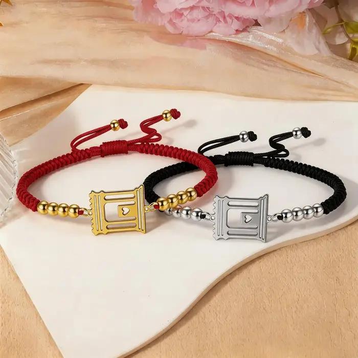 Bracelet ajustable en corde tressée avec pendentif charme du Temple Saint