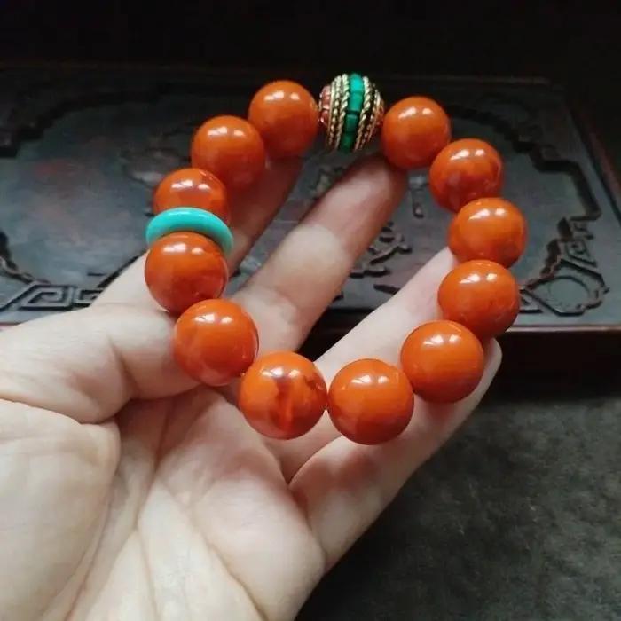 Bracelet de perles rondes orange avec intercalaire turquoise