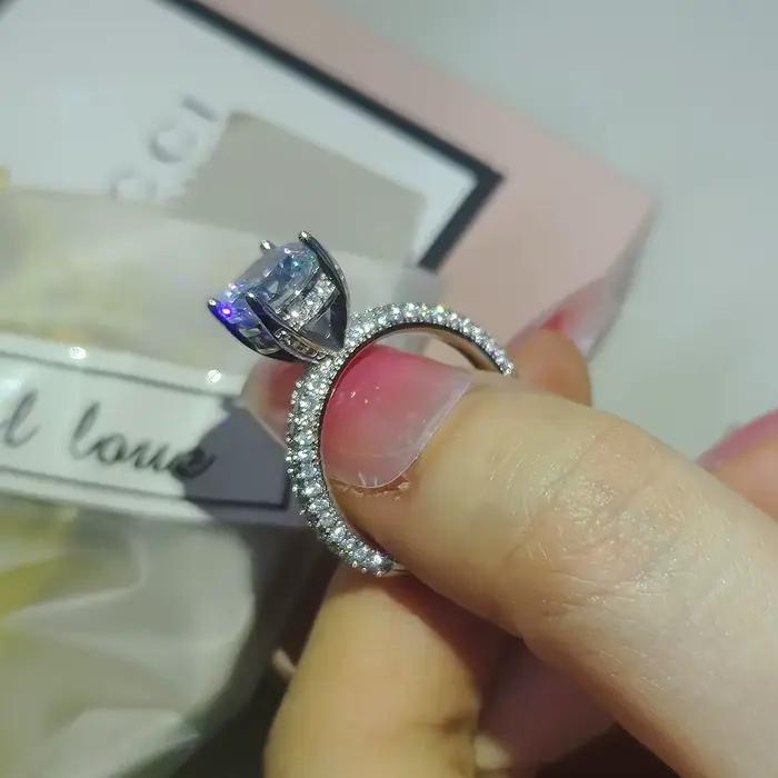 Bague de fiançailles en argent sterling 925 sertie de zirconium blanc élégante pour célébrer l'engagement et les occasions spéciales pour femme