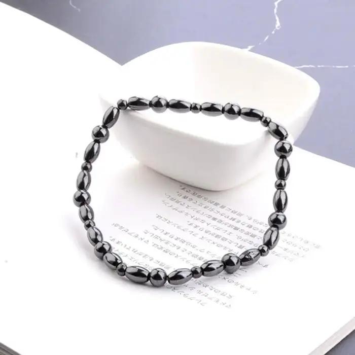 Bracelet de cheville en pierre noire magnétique avec perles en hématite noire pour femmes, élégant et confortable pour toutes les occasions