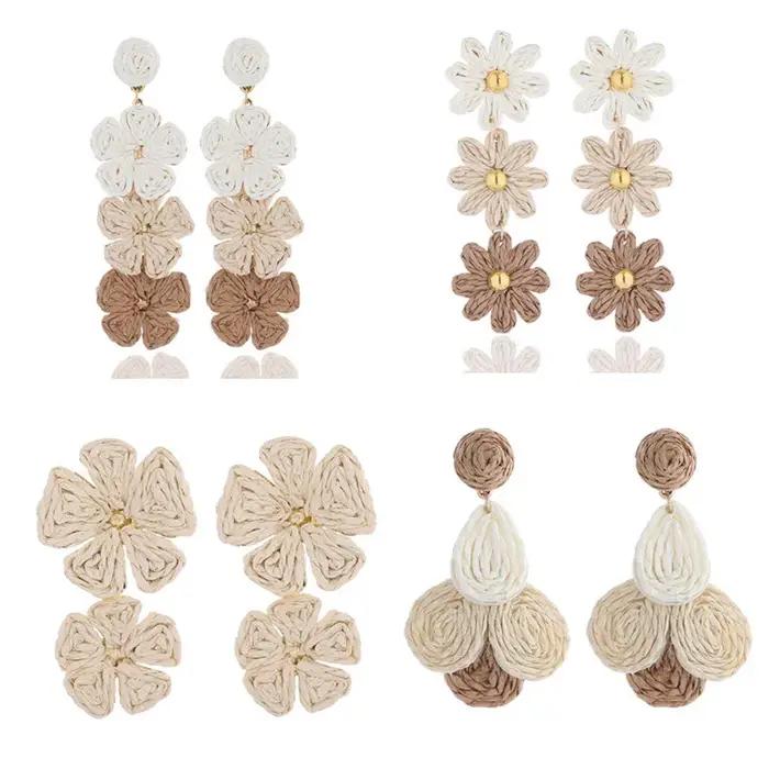 Boucles d'oreilles pendantes en forme de fleur enveloppée de paille en raphia pour femmes