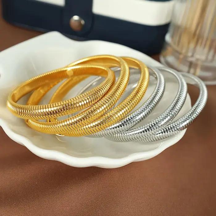Bracelet en acier inoxydable imperméable plaqué or 18 carats unisexe pour hommes et femmes avec élasticité rétro et finition élégante pour toutes les occasions