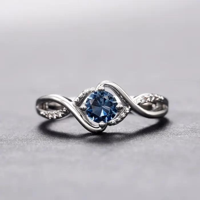 Alliance de mariage Huitan en laiton avec zircone cubique bleue, moderne et élégante pour mariage et anniversaire de mariage