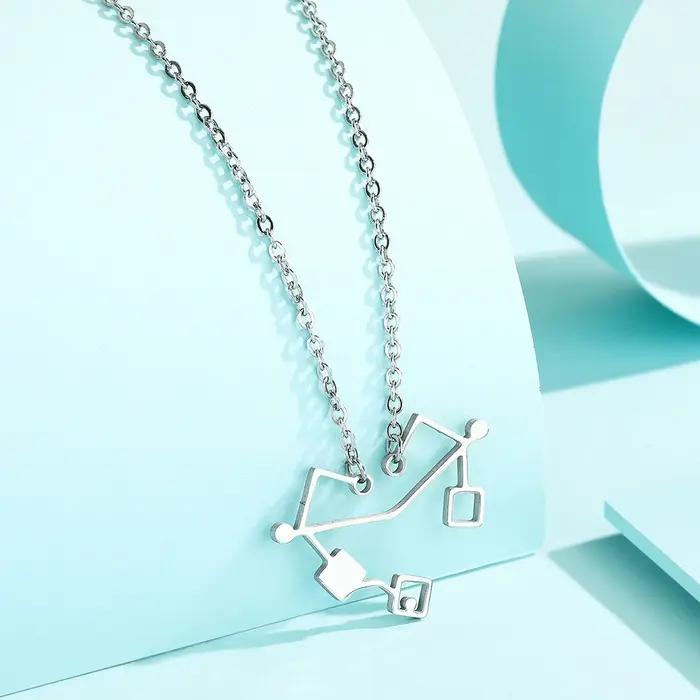 Kinitial-Collier Coeur d'Etheria en Acier Inoxydable
