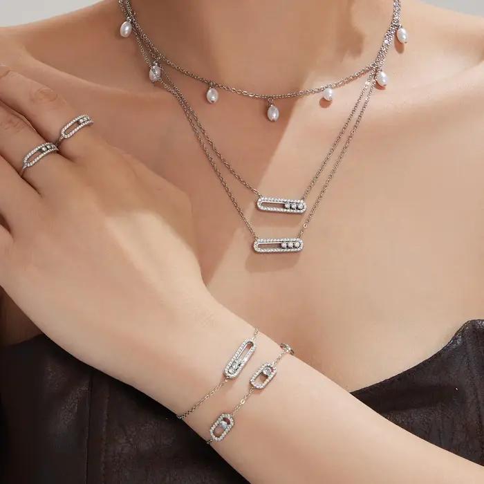 Parure de bijoux pour femme en acier inoxydable plaqué or 18 carats avec pendentifs