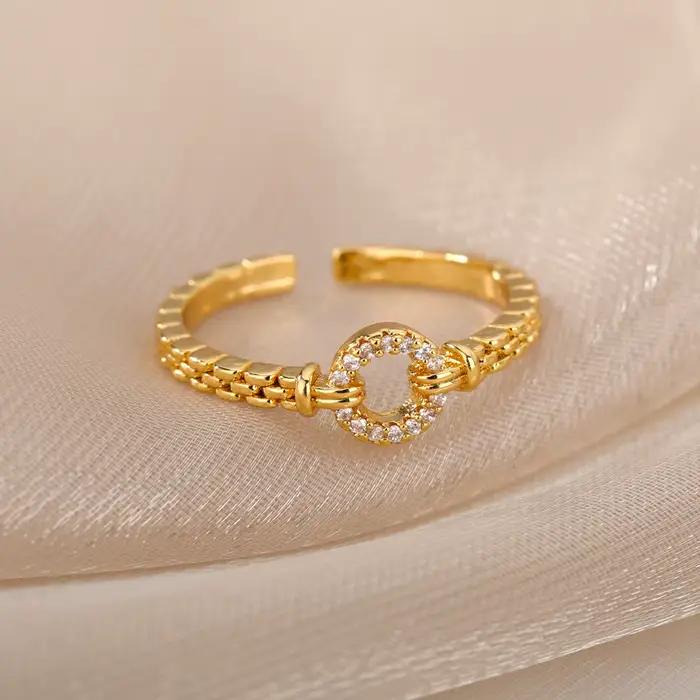 Bague en acier inoxydable plaquée or 18 carats avec zirconium blanc et noir pour femmes style punk rock occasions spéciales