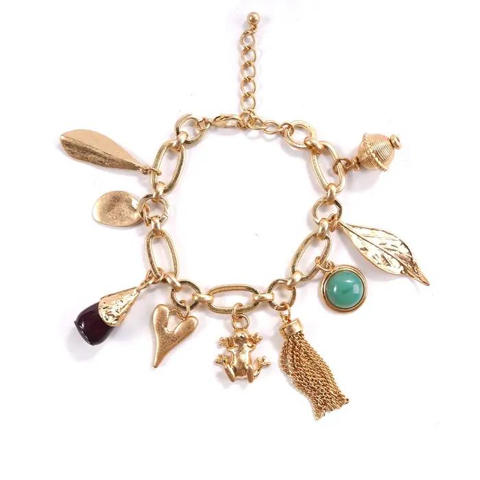 Bracelet à pampilles dorées et pierres précieuses