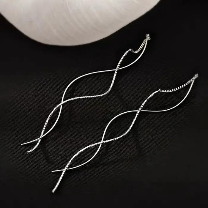 Boucles d'oreilles minimalistes à franges longues et ondulées pour femmes