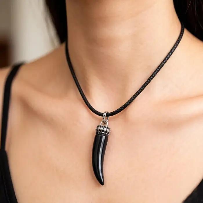 Collier de perles dent