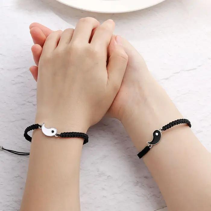 1 lot de 2 bracelets de réglage télescopique tressés en corde Yin et Yang simples Tai Chi Bagua noir et blanc pour hommes et femmes Coupl