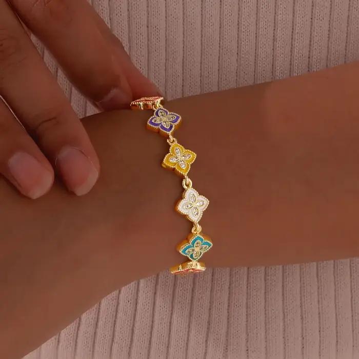 Bracelet trèfle à quatre feuilles élégant en cuivre doré pour femmes cadeau amitié anniversaire fiançailles