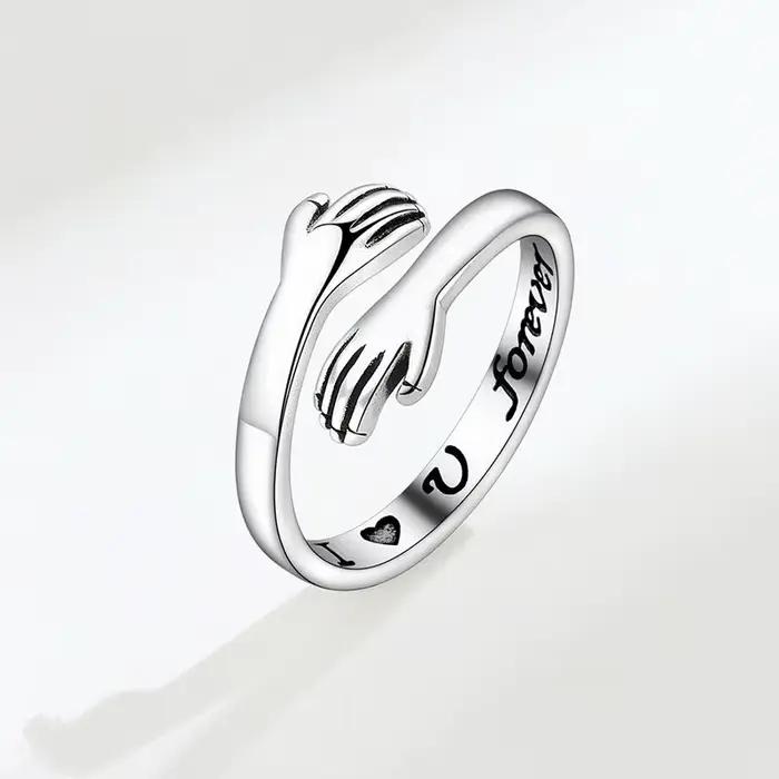 Bague romantique en forme de cœur ajustable pour femmes et hommes alliances de mariage en alliage de zinc blanc or noir pour célébrer l'amour et l'amitié
