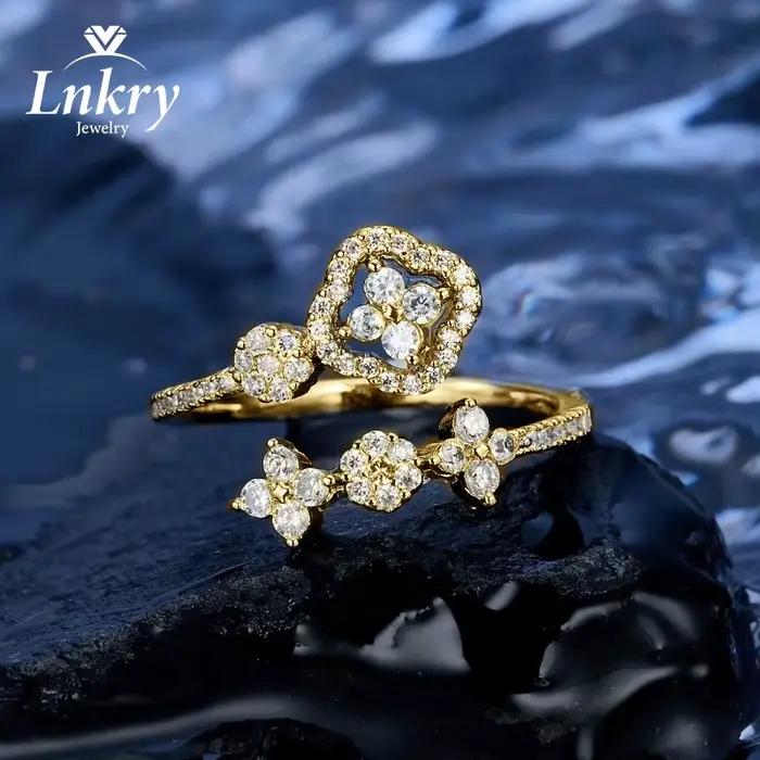 Bague réglable en or 14 carats pour femmes sertie de moissanite et zircon fleur à quatre feuilles bijou cadeau occasion spéciale