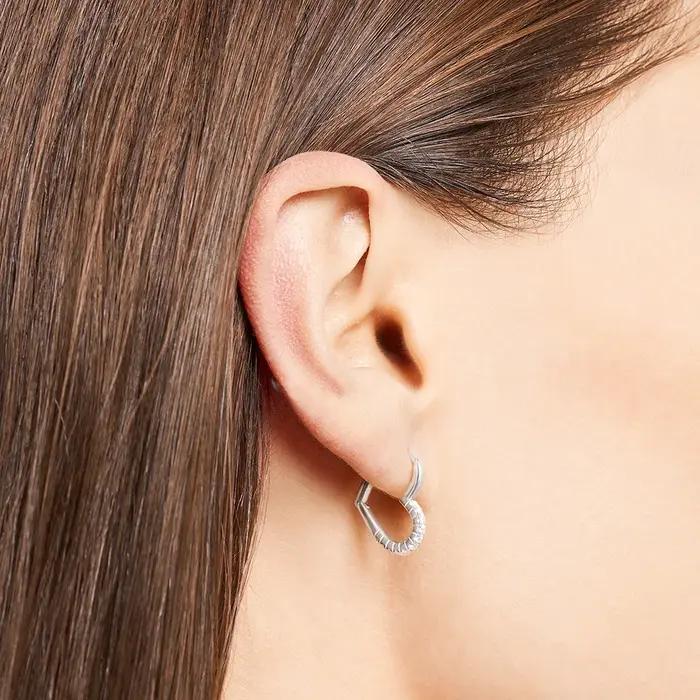 Boucles d'oreilles créoles en forme de cœur avec pierres blanches