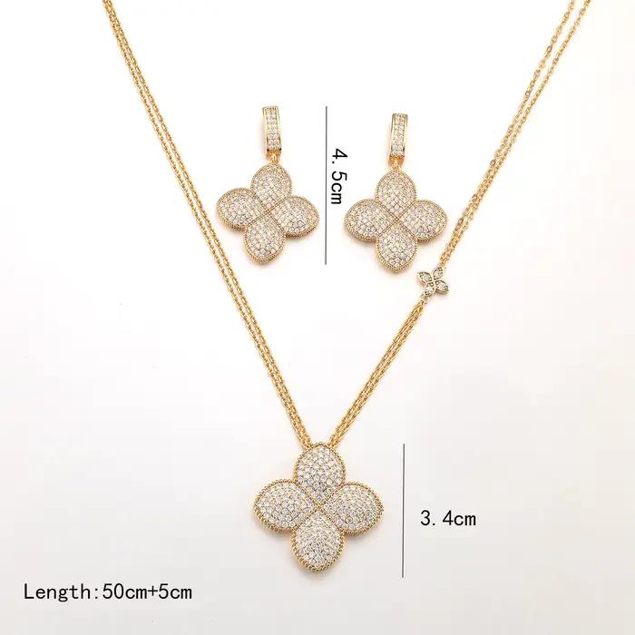 Ensemble de bijoux élégant collier et boucles d'oreilles trèfle sertis de zircone cubique plaqués or 18 carats pour femmes occasions spéciales soirée mariage
