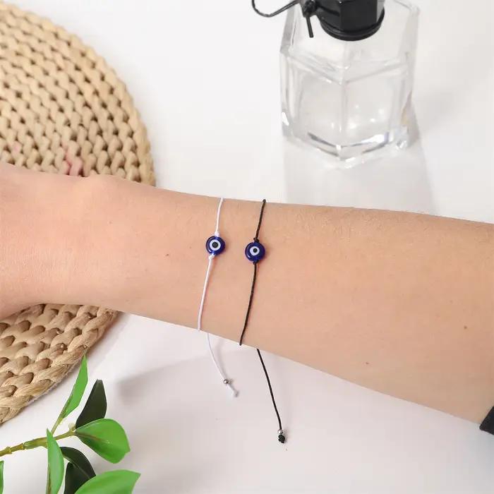 12 pièces Bracelets en corde noire et blanche en verre œil du diable bleu pour hommes et femmes Couples