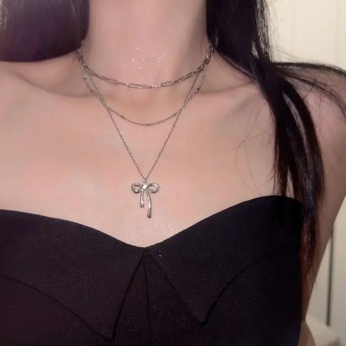 Collier pendentif Chic avec nœud papillon pour femmes, accessoire d'été de Style doux et Cool, chaîne de clavicule pour filles à la mode