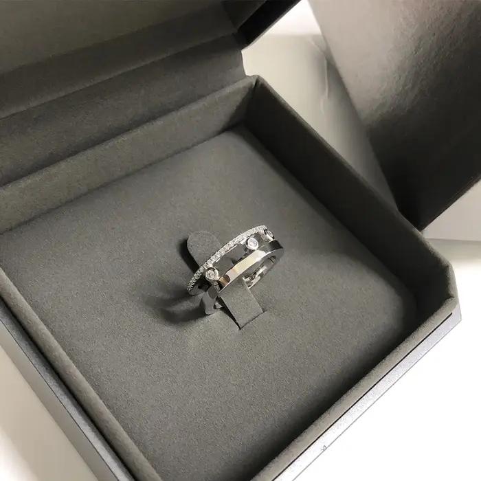 Bague de marque réputée, haute qualité, trois diamants coulissants