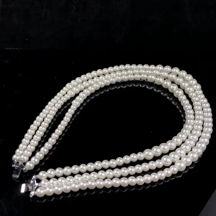 Ensemble de colliers superposés en perles de luxe avec pendentif broche aile de diamant