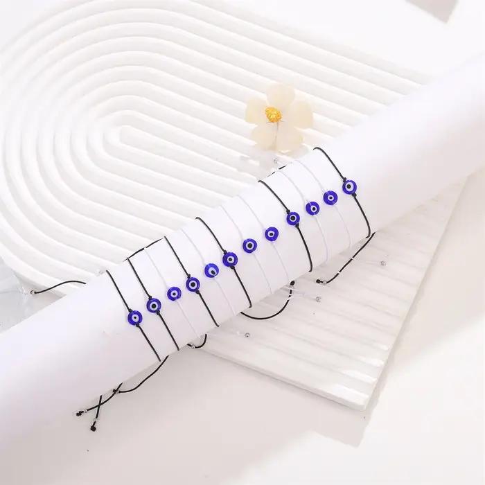 12 pièces Bracelets en corde noire et blanche en verre œil du diable bleu pour hommes et femmes Couples
