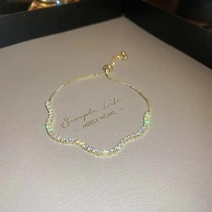 Bracelets en strass ronds brillants pour femmes, bracelet fin de luxe à motif ondulé réglable, design polyvalent, bijoux pour les mains K1