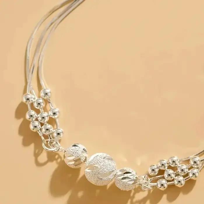 Bracelet en argent sterling 925 élégant avec breloques rondes pour femmes occasions spéciales style moderne tendance