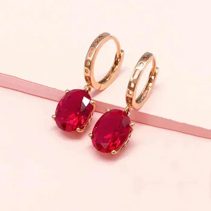 Boucles d oreilles en plaqué or rose 14k avec zirconium rouge pour femmes occasions spéciales élégantes et glamour