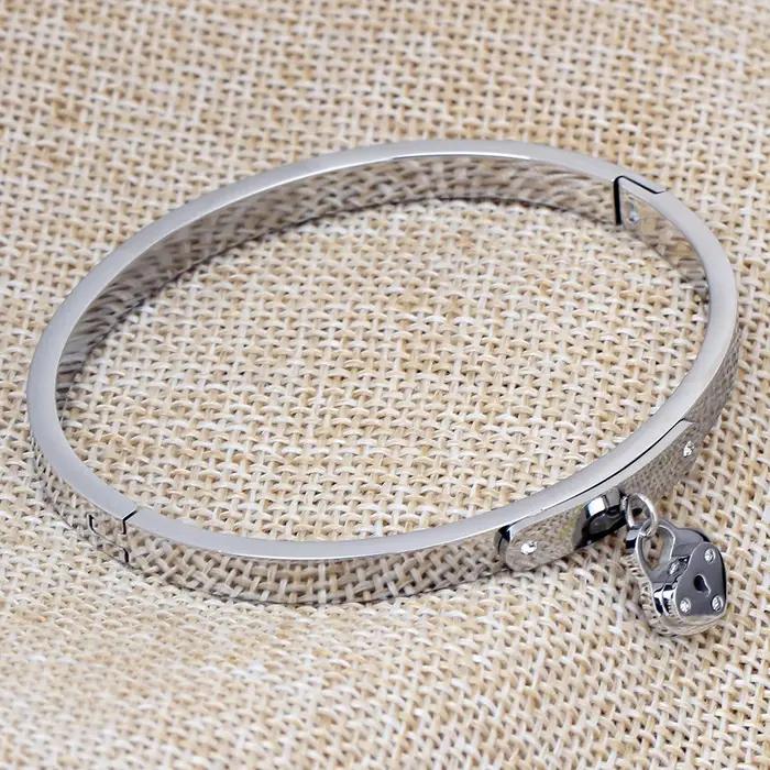 Bracelet en acier inoxydable serti de cristal or rose pour femmes occasions spéciales symbole amour éternel