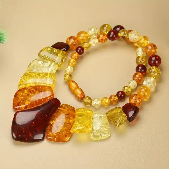 Nouveau collier ambre de cire d'abeille élégant et à la mode