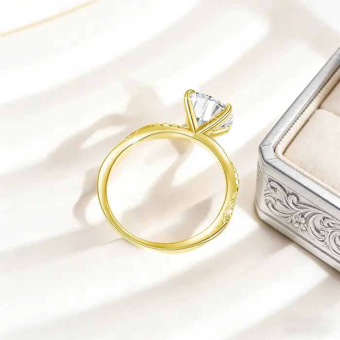 Bague solitaire torsadée en moissanite ronde 2 carats Au585